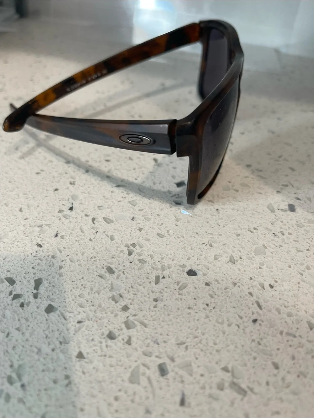 Oakley Tortoise Shell Sunglasses with Dark Gray Lenses